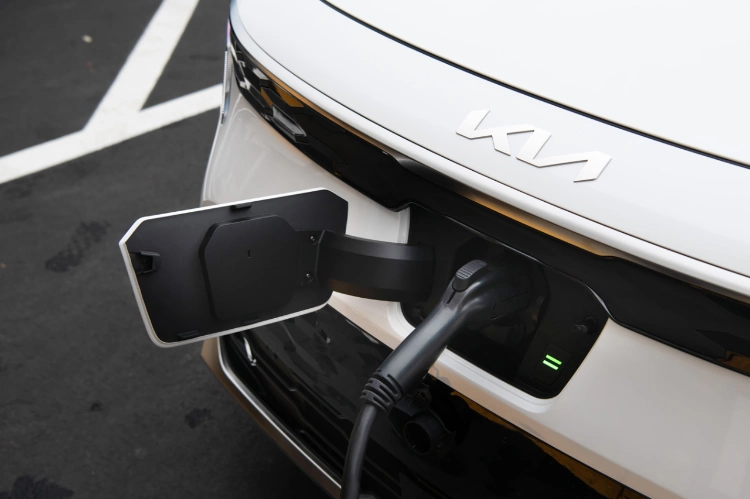 2024 Kia Niro EV Utilizing Fast-Charging At A Public Charging Station Close-Up