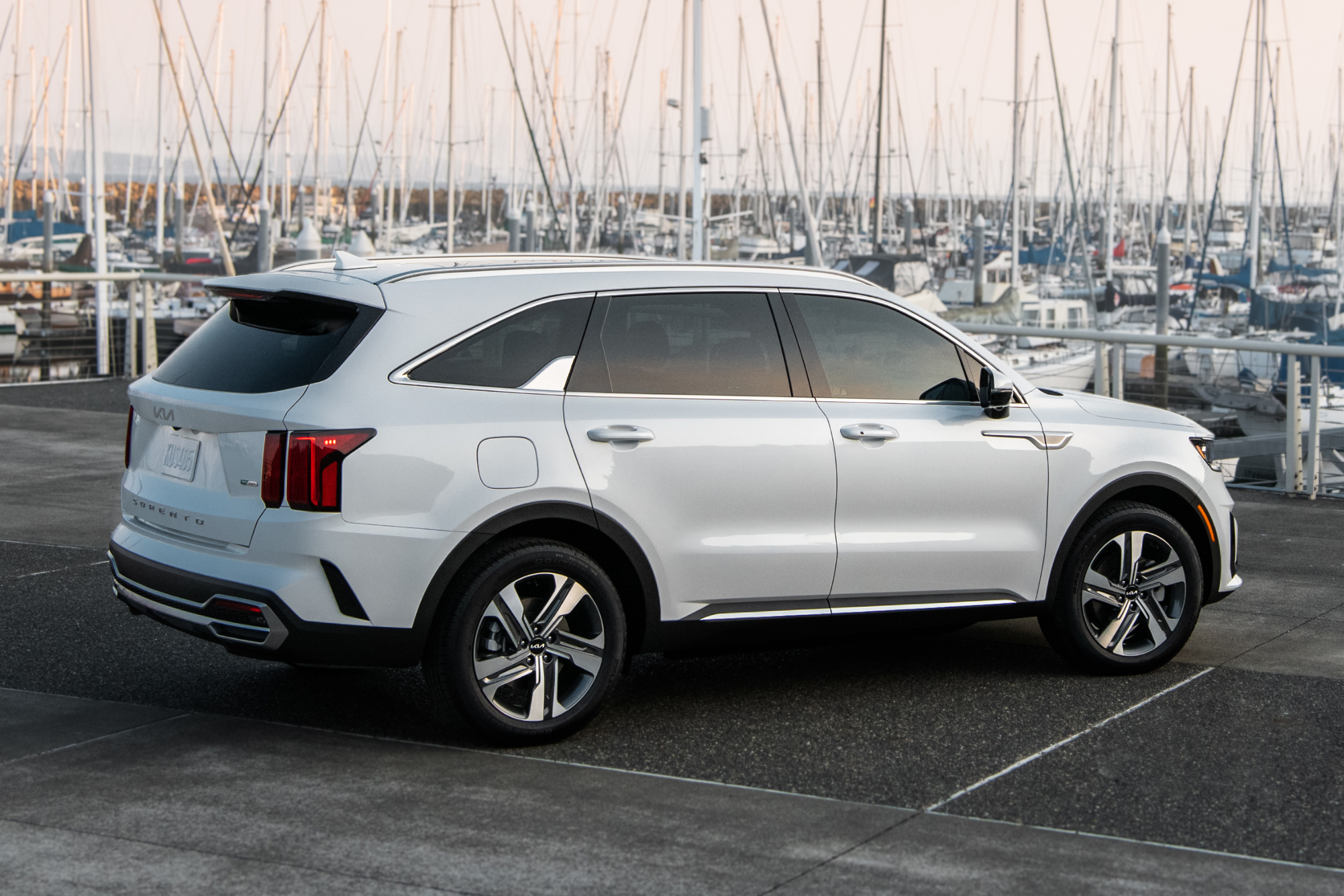 White Sorento Exterior Rear with boats in the background
