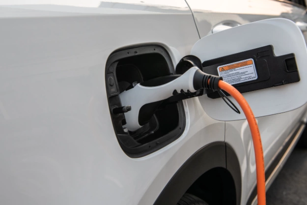 2024 Kia Sorento Plug-In Hybrid Utilizing A Public Charger To Charge Its Battery Close-Up