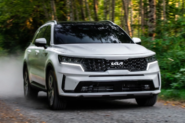 2024 Kia Sorento Plug-In Hybrid Driving Off-Road On Gravel Terrain In A Forest Environment Front-View