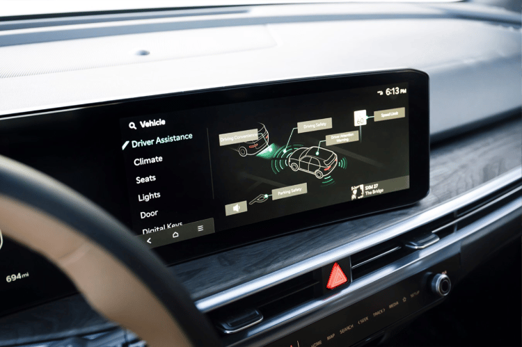 Vehicle interior zoomed in view of the full dashboard, featuring the Dual Panoramic Display