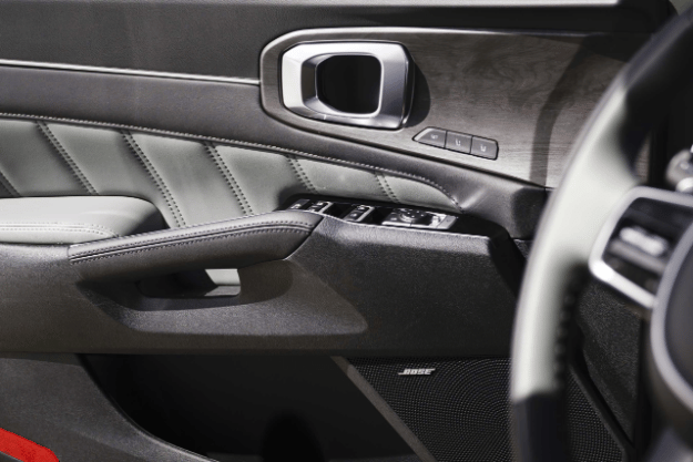 2025 Kia Sorento X-Pro SX Prestige AWD interior with sage green trim on the door