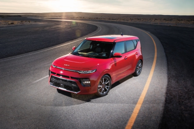 2022 Kia Soul Parked On An Open Road At Sunrise Three-Quarter View