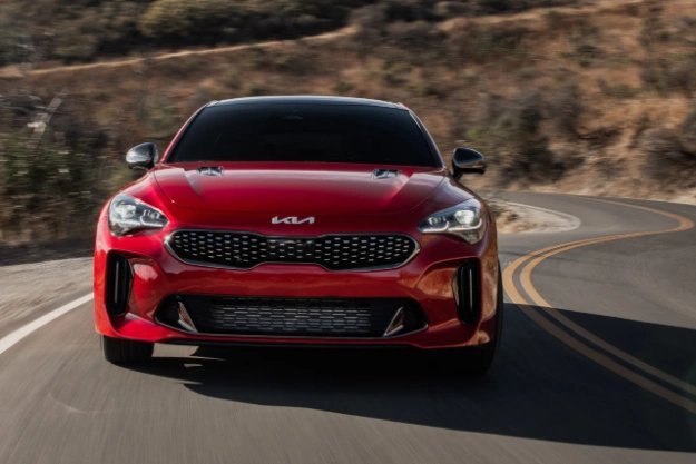 2023 Kia Stinger Driving Fast In The Mountains Front View