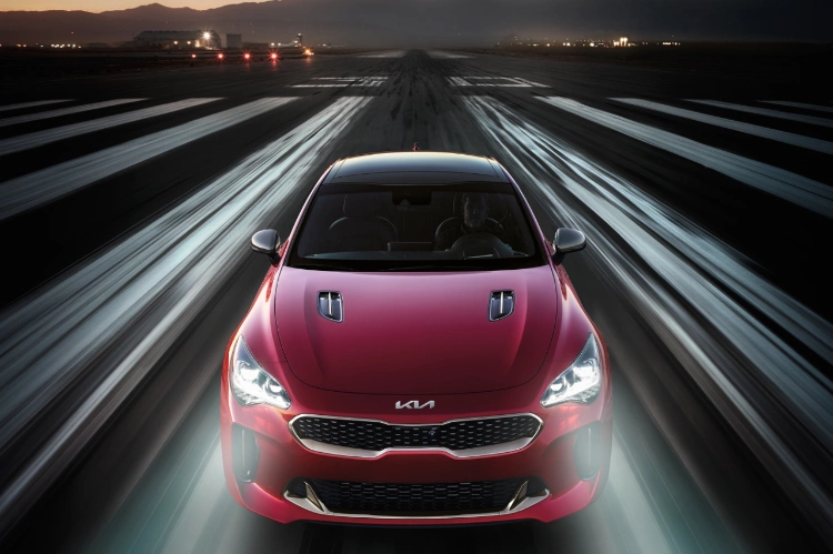 2023 Kia Stinger Driving At Night With LED Headlights Front View