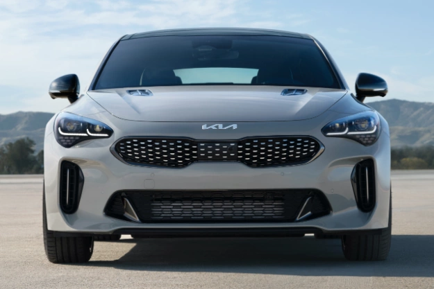 2023 Kia Stinger Parked In Front Of Mountains Front View