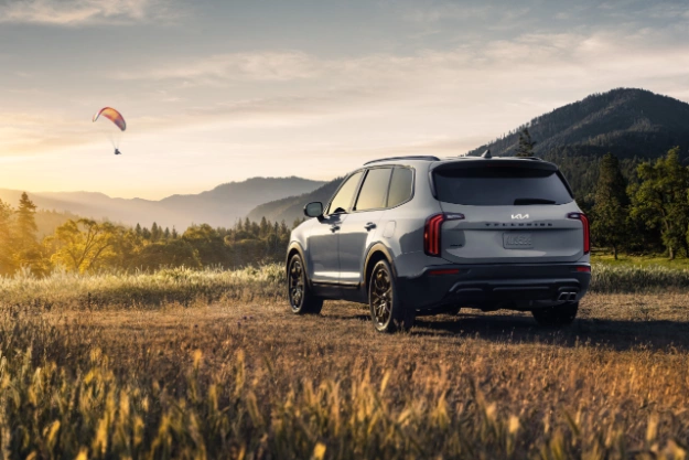 2022 Kia Telluride Parked Off Road In The Mountains At Sunrise Rear Three-Quarter View