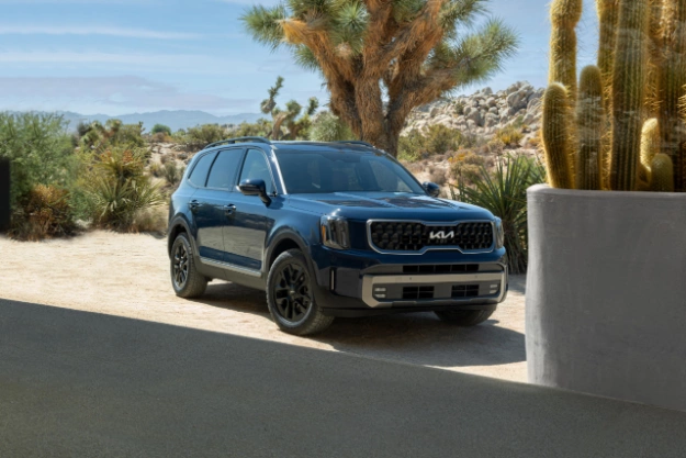 2023 Kia Telluride Parked Behind A Cactus Three-Quarter View