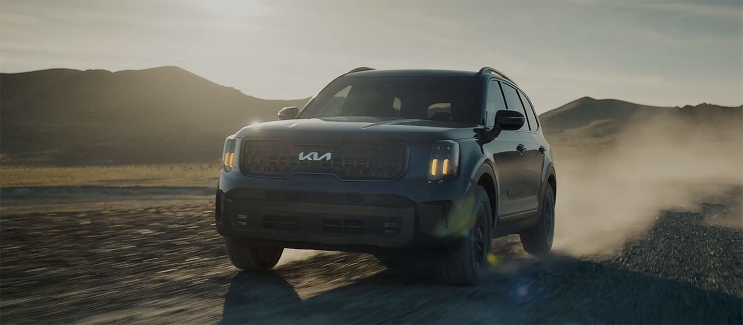 Next Generation Telluride, three-quarter front view, driving on a dirt road.