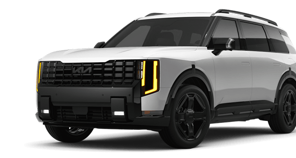 Left facing Telluride X-Line SXP AWD trim vehicle image in Terrain Brown.