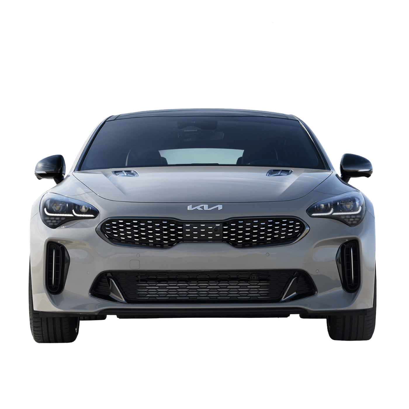 The front of a Kia sedan highlighting its grille and front styling.