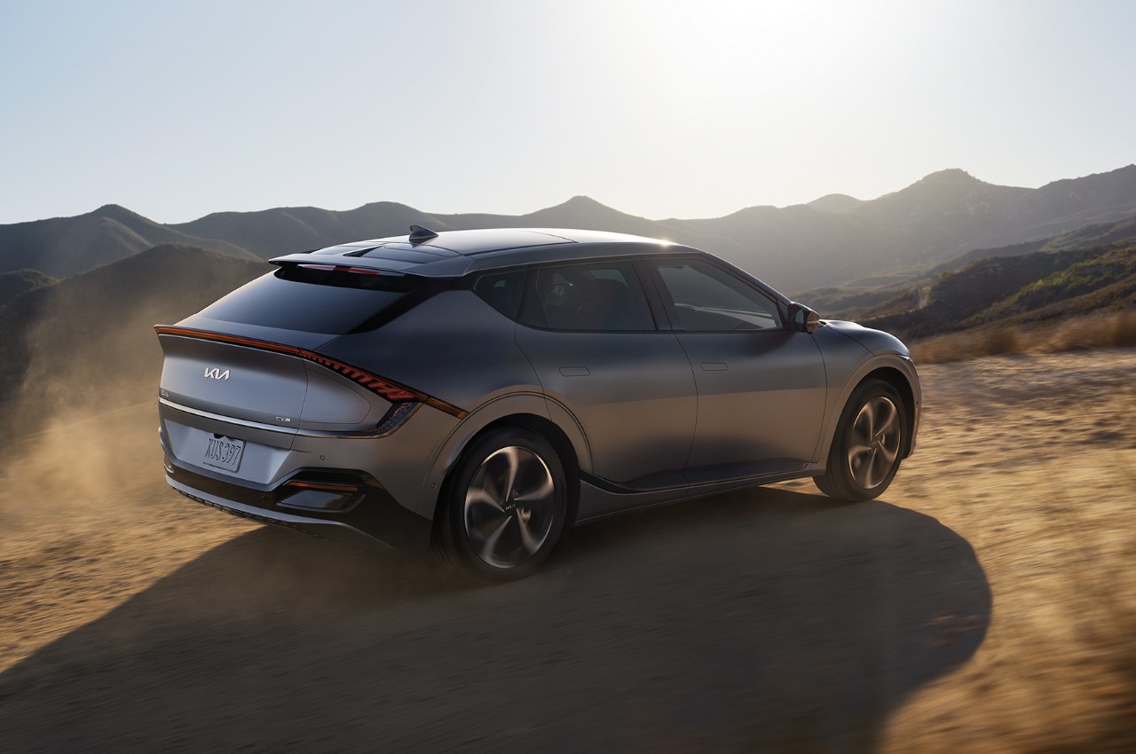 2022 Kia EV6 Driving Off Road In The Mountains Rear Three-Quarter View