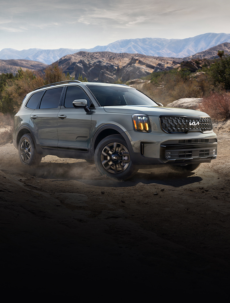 2024 Kia Telluride Driving Through An Off-Road Trail Three-Quarter View 